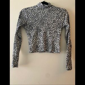 Cropped turtle neck.